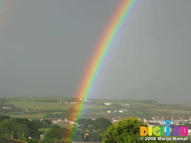 27058 Rainbow over fields and houses